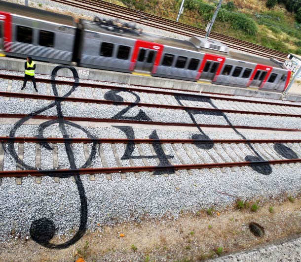 Portuguese artist Artur Bordalo rail track art